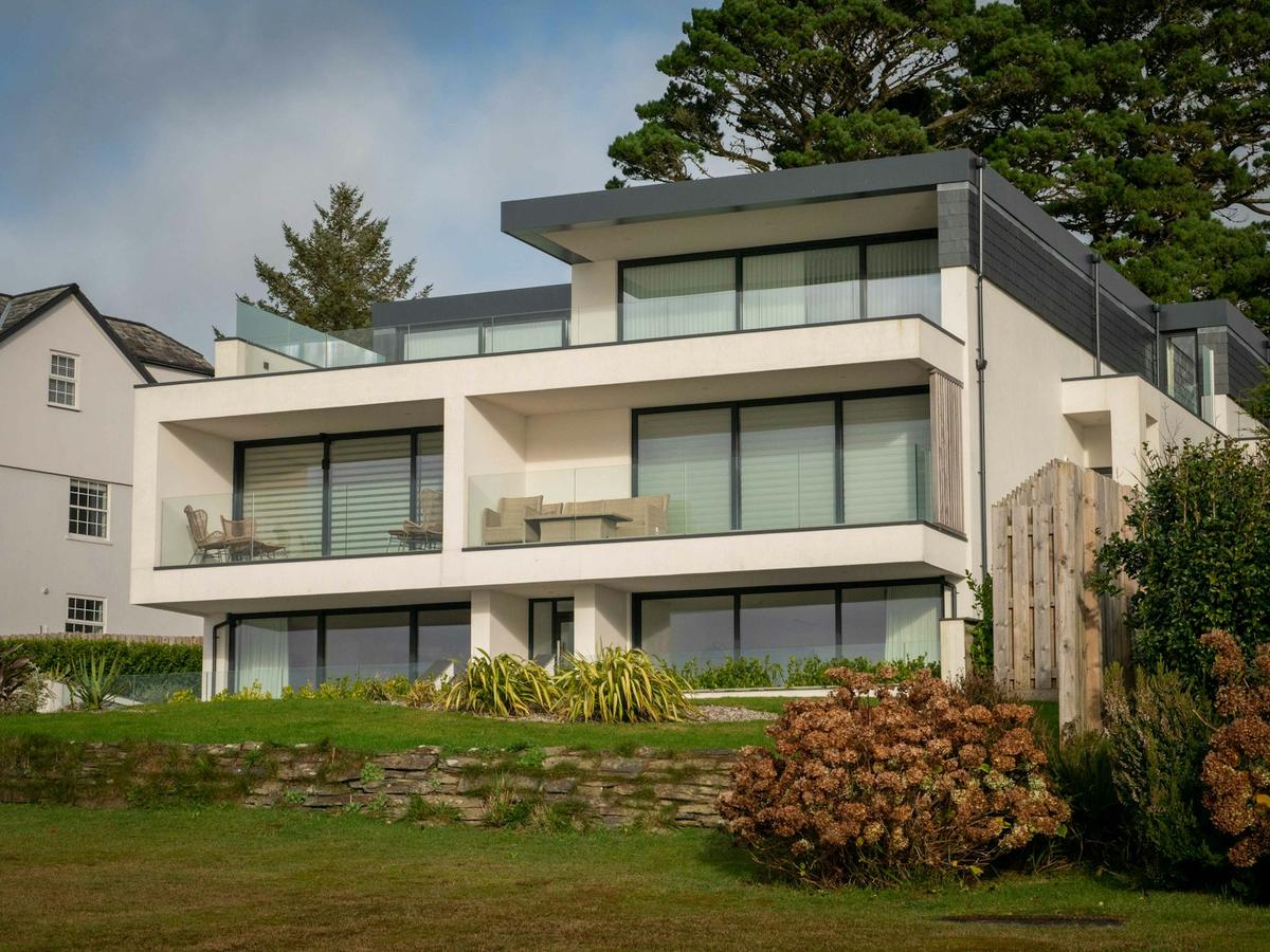 Modern energy-efficient home set on a green lawn